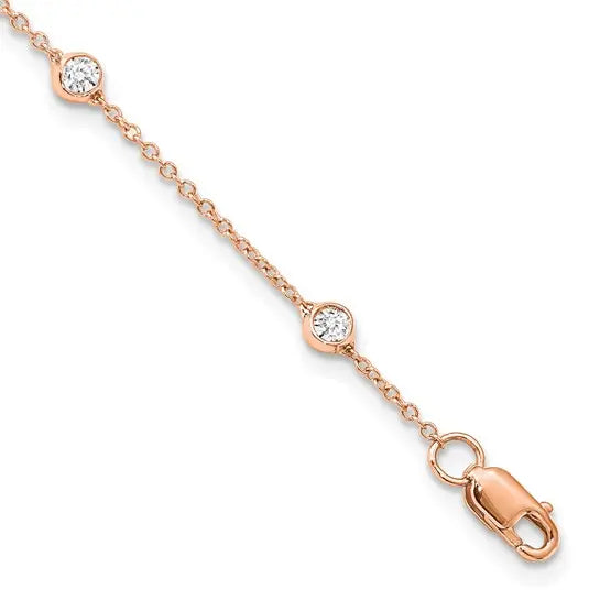 14K rose gold 1/2 carat lab grown diamond station bracelet close-up with lobster clasp on white background
