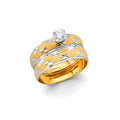 14K two-tone yellow and white gold diamond-cut star pattern CZ solitaire engagement ring stacked with matching wedding band on white background