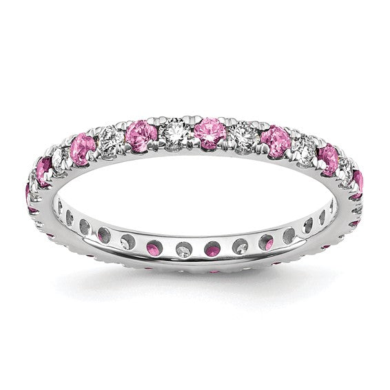 14K white gold eternity band with alternating lab grown diamonds and lab created pink sapphire round stones front view on white background
