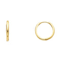 14K yellow gold 15mm plain huggie hoop earrings with polished finish and hinged snap closure on white background