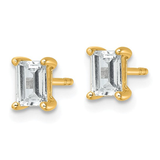 Side profile of 14K yellow gold IGI certified lab grown diamond emerald cut stud earring showing 4-prong setting on white background