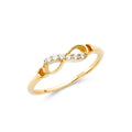14K yellow gold infinity ring with cubic zirconia stones and polished finish on white background