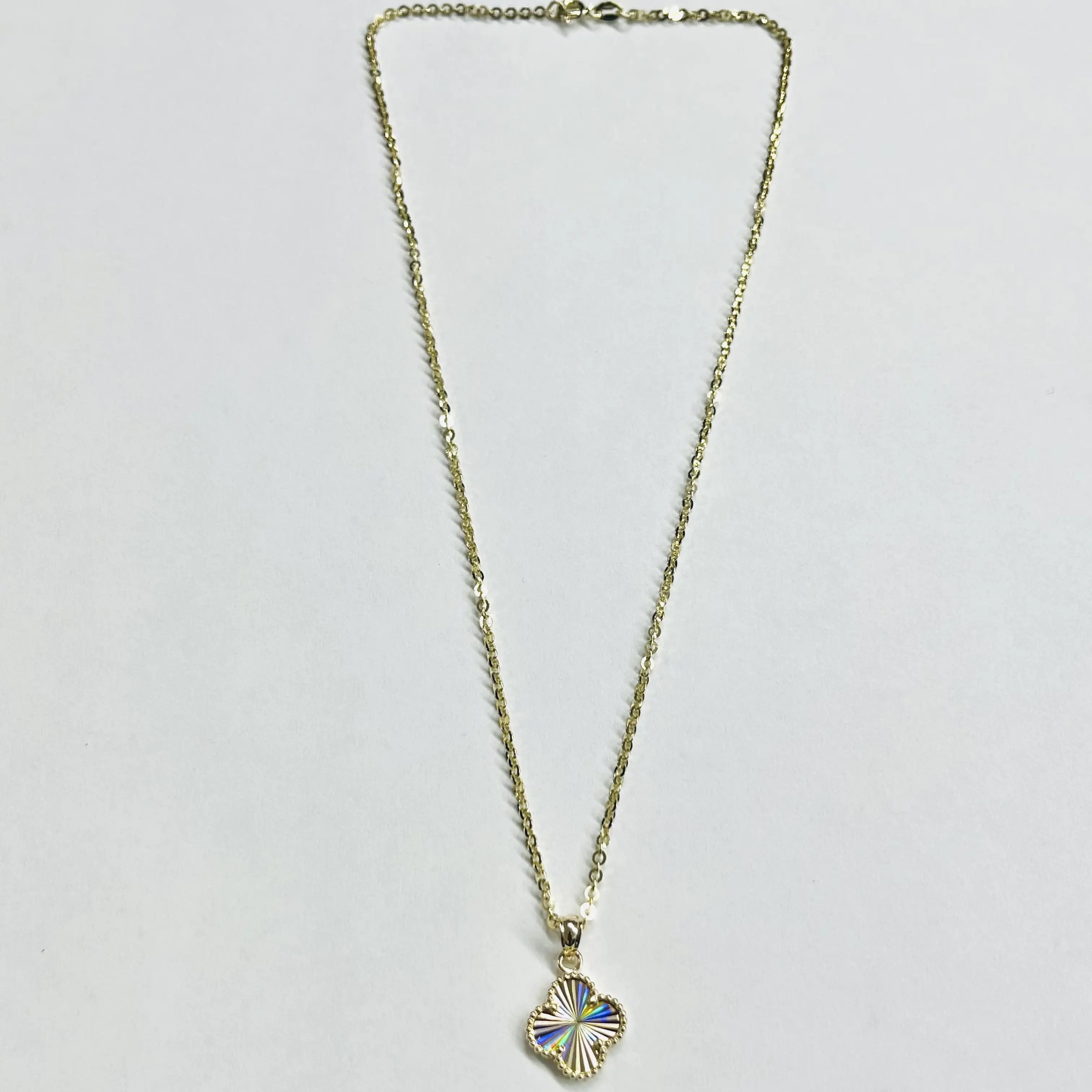 14K yellow gold four-leaf clover necklace full length flat lay showing 16 inch cable chain and spring ring clasp