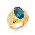 14K yellow gold men's wide nugget textured statement ring with bezel-set oval blue CZ center stone on white background