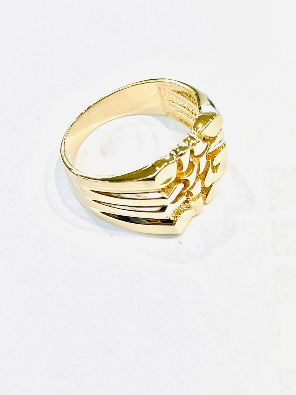 14K yellow gold men's nugget ring side view showing grooved band detail and nugget texture pattern