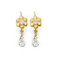 14K yellow gold flower and pear drop earrings with satin flower top, round white CZ center, and pear white CZ drop, kidney wire closure, on white background