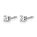 Pair of diamond stud earrings on a white background