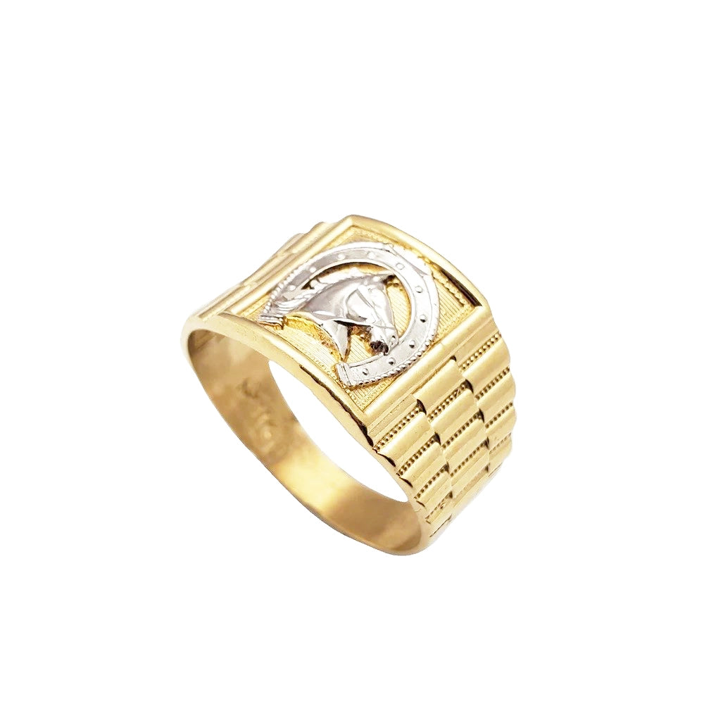 14k old ring with a unique horse shoe on a white background