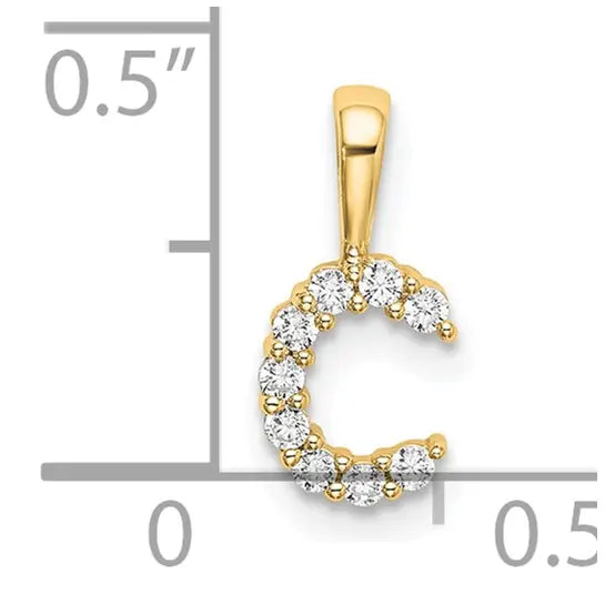 14K yellow gold 1/10 carat lab grown diamond initial C pendant shown beside inch scale on white background